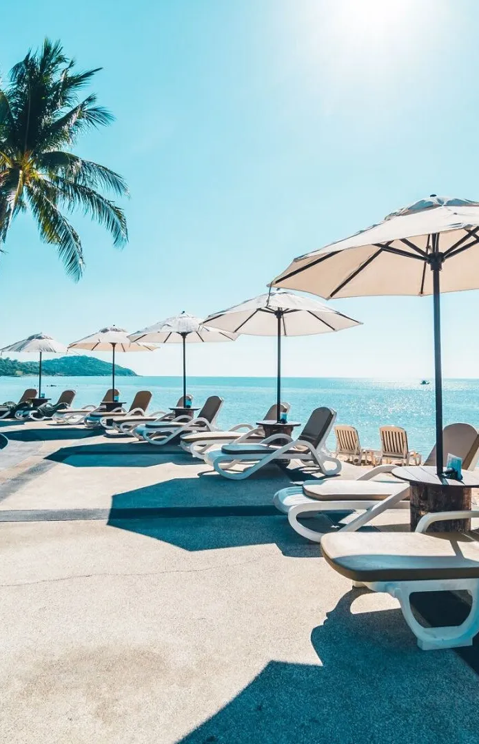 Beautiful tropical beach and sea with umbrella