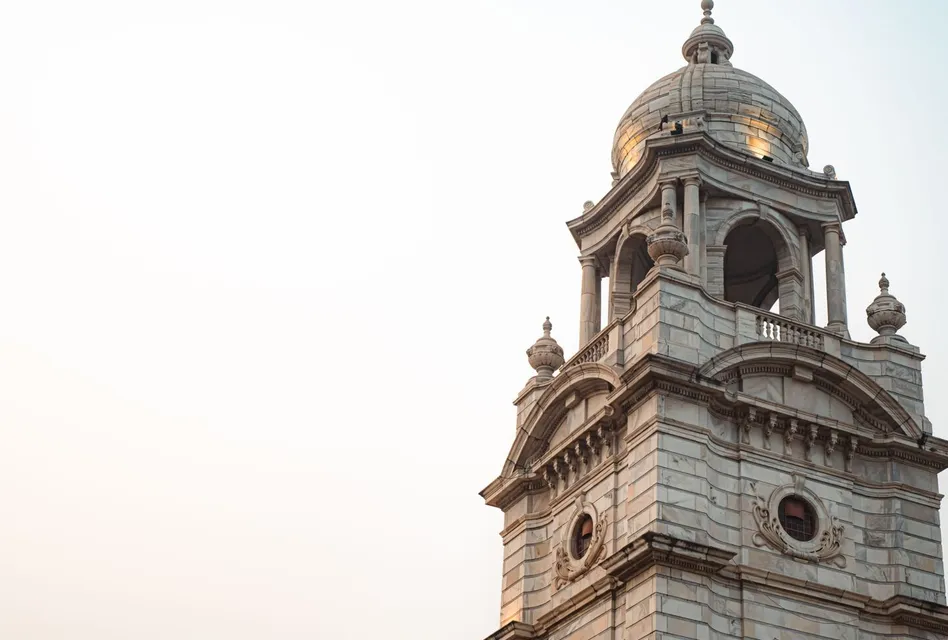 Majestic view of an old stone clock tower with