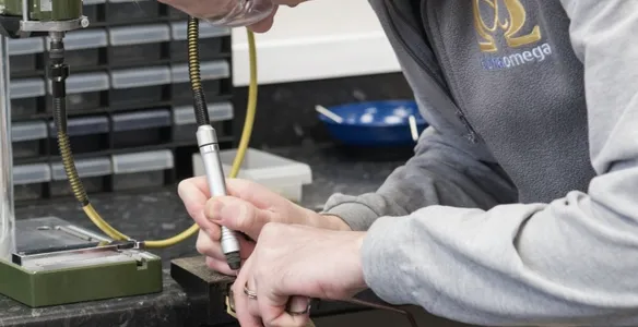 Technician repairing glasses