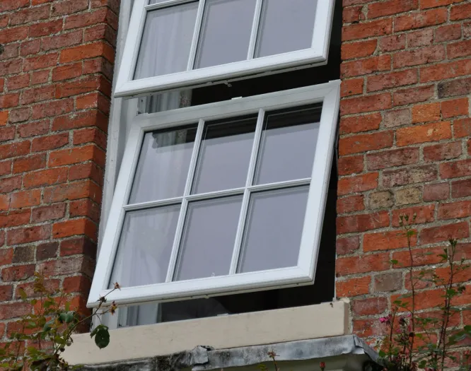 Tilt and turn window with red brickwork