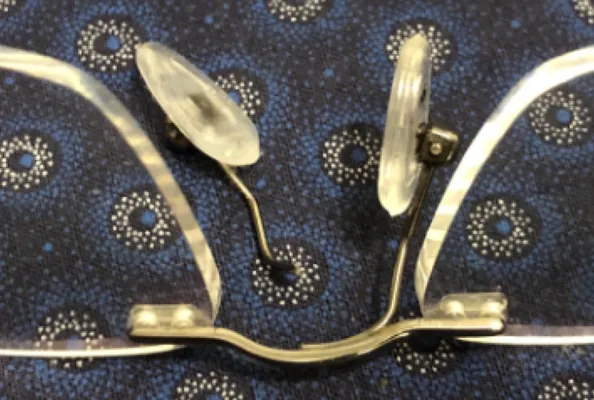Broken nose pad on glasses