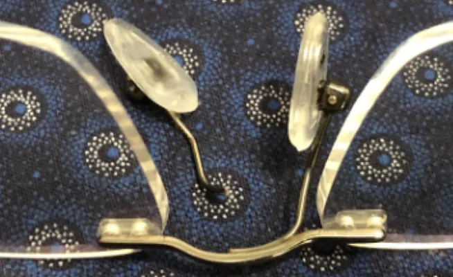 Broken nose pad on glasses