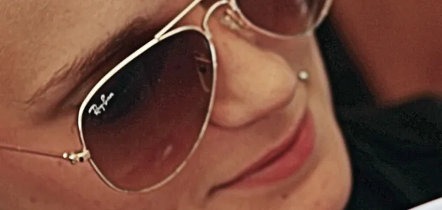 Woman wearing Ray-Ban sunglasses