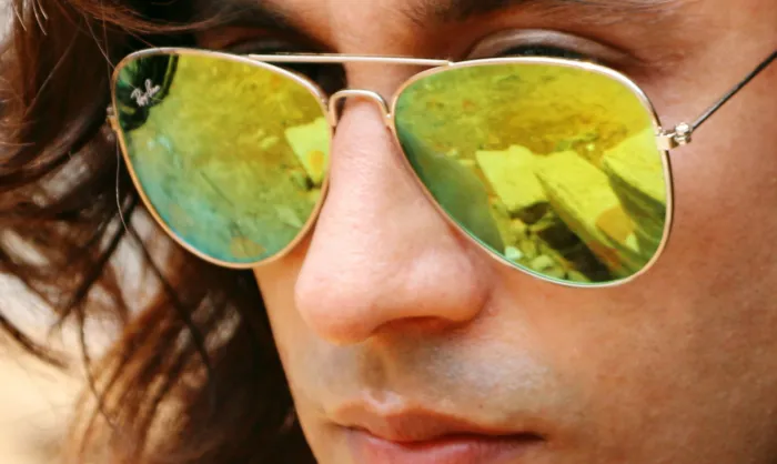 Man wearing Ray-Ban sunglasses