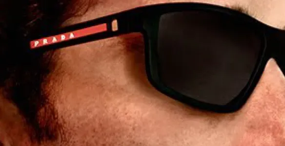 Man wearing Prada sunglasses