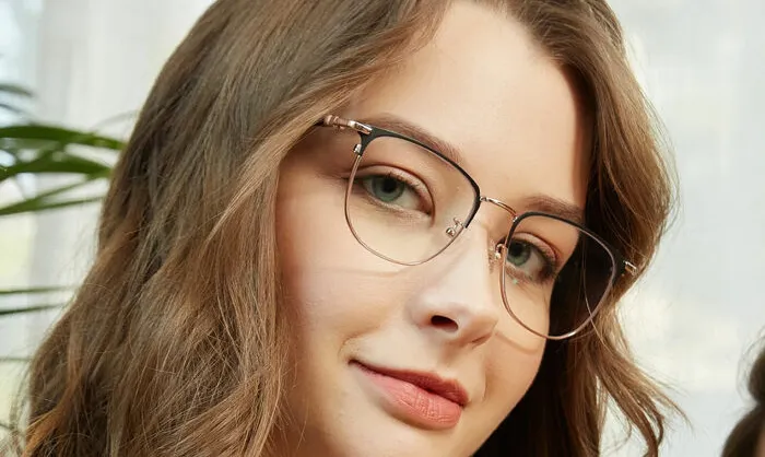 Woman wearing metal frame spectacles
