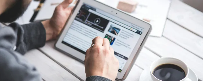 Man using stylus pen for touching the digital tablet screen