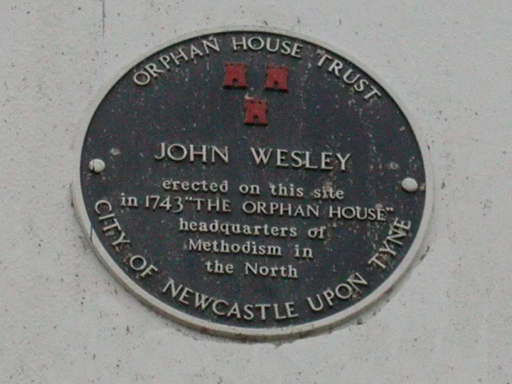 A circular heritage plaque for the Orphan House Trust