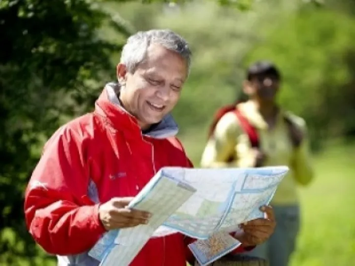 Walker Looking at Map_Landscape