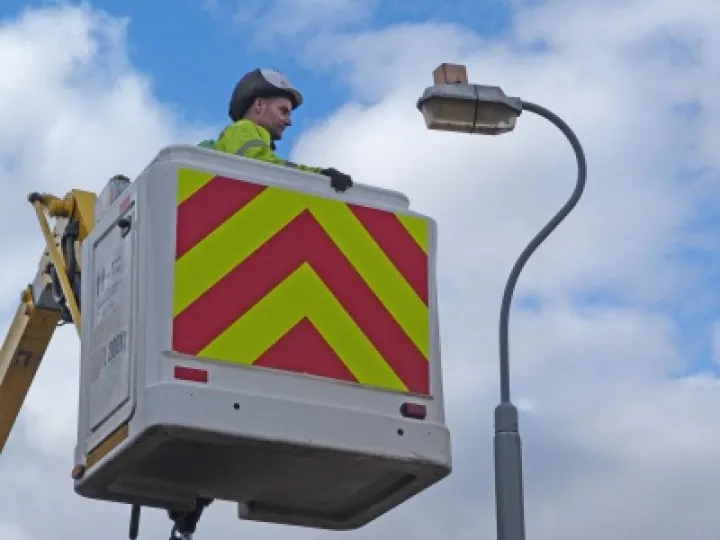 TfB worker on lift with lamp post low res