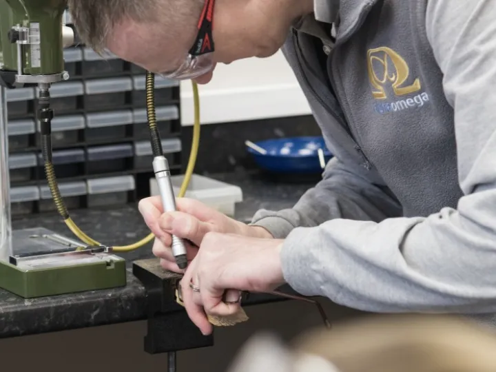 Technician repairing glasses