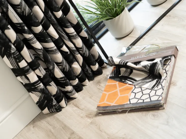 Black and white curtains with fabric book