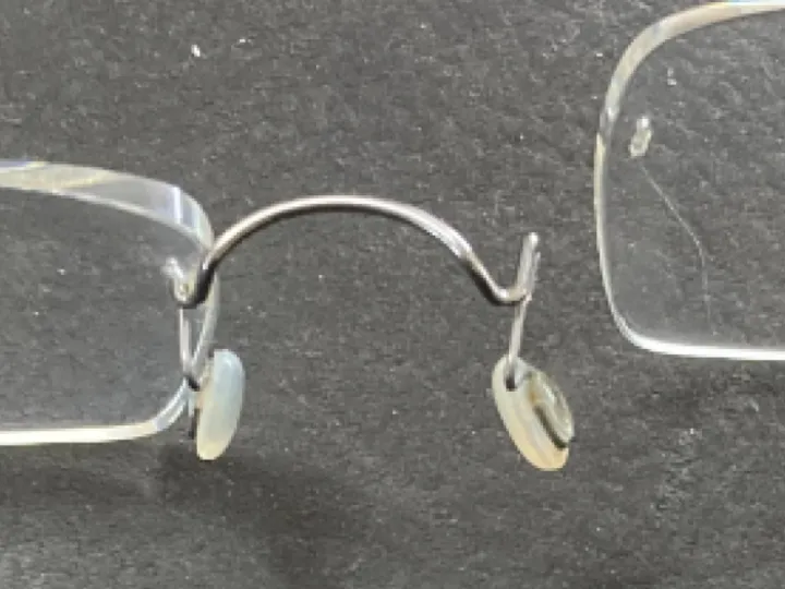 Broken rimless glasses