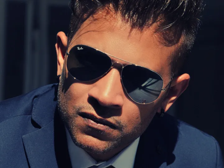 Man wearing Ray-Ban sunglasses