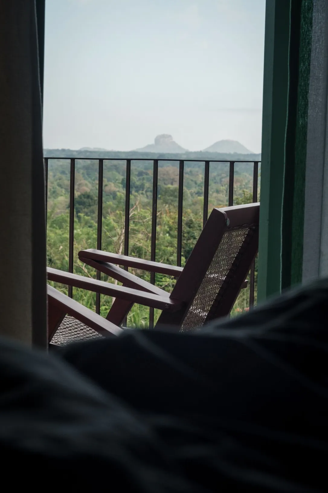 Sigiriya Rock Fortress seen from the balcony of the 360 View Suite at Peacock Hill Sigiriya