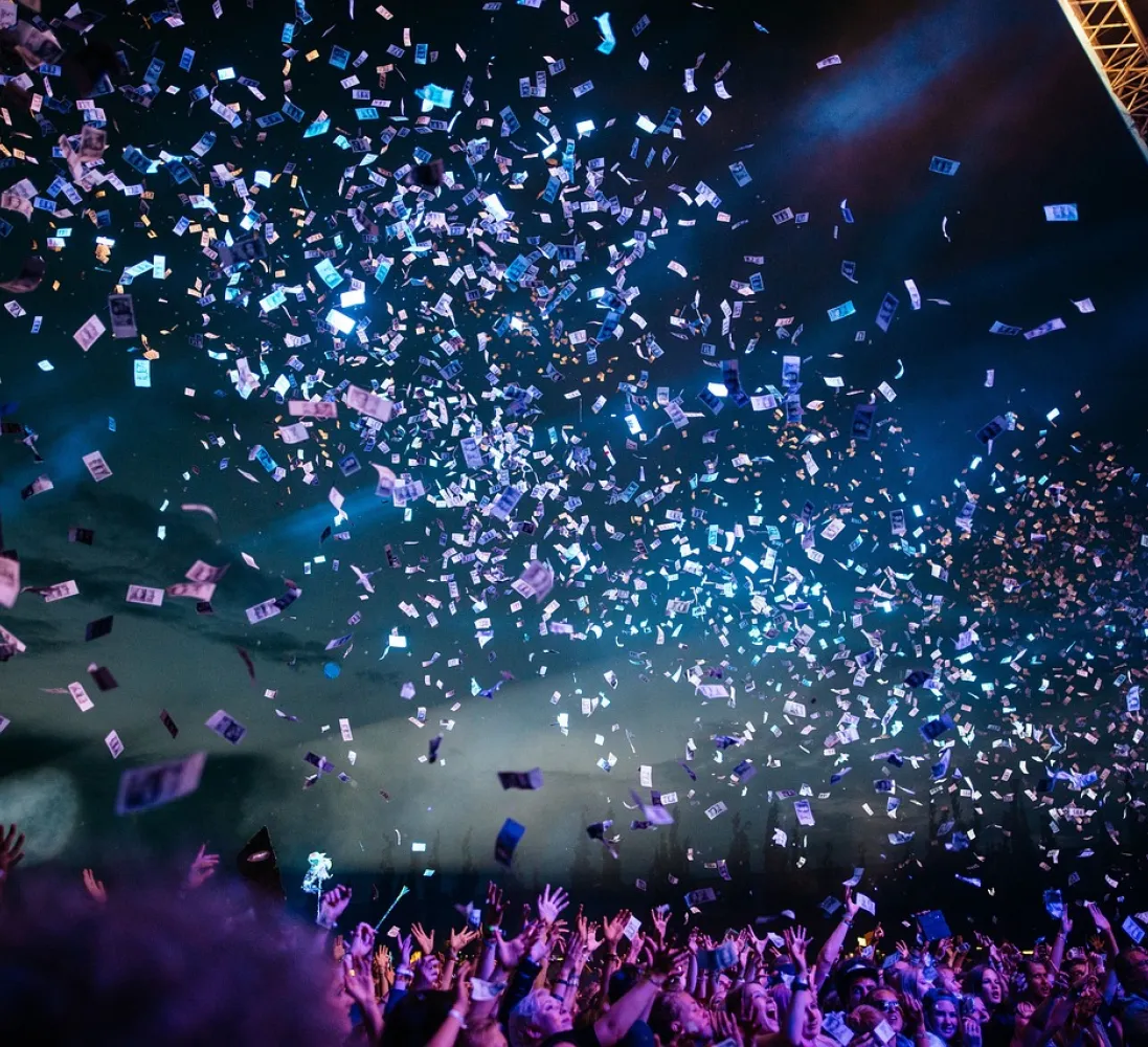Confetti cascading down during a rock concert