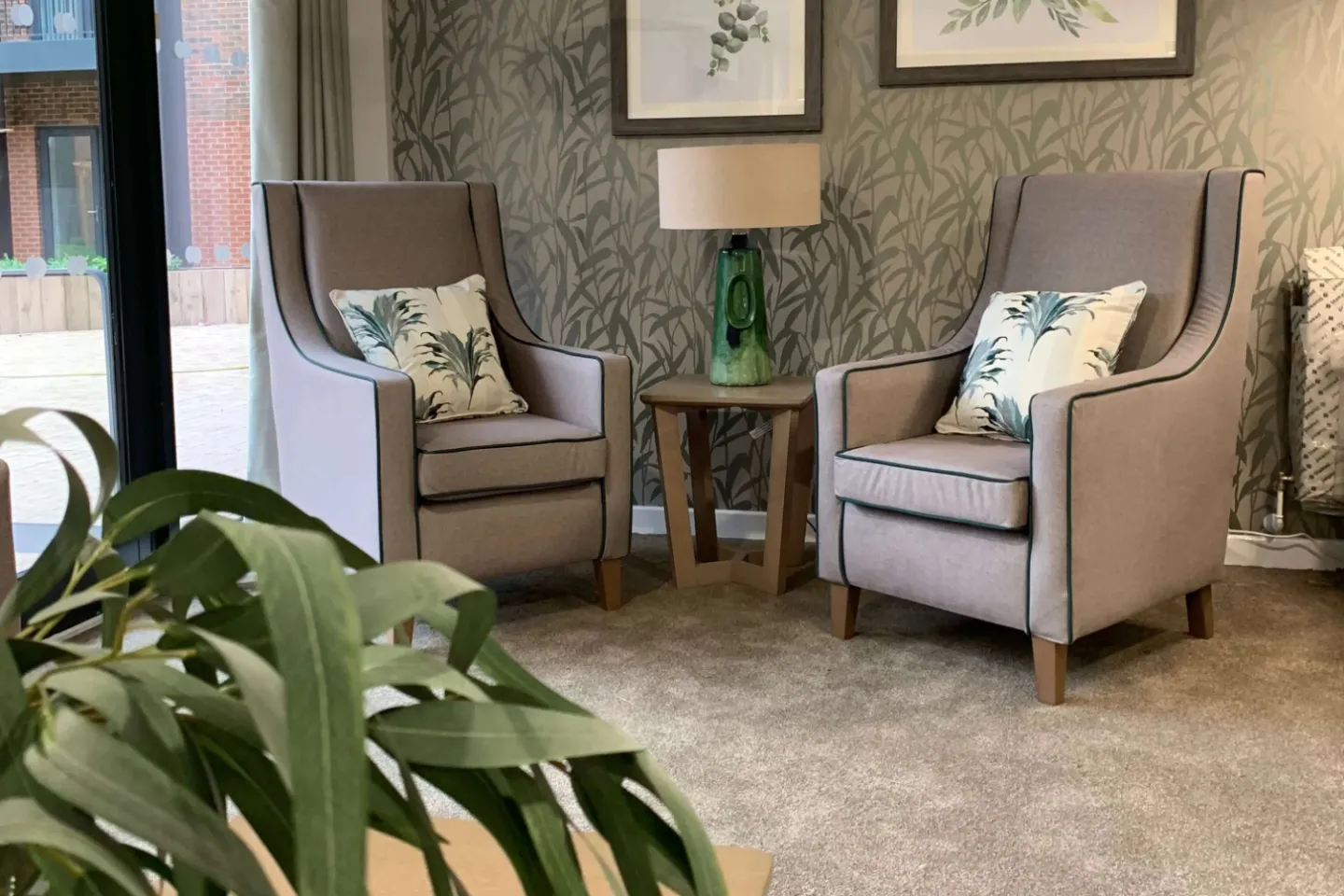 Gorton Mill with grey chairs and plant