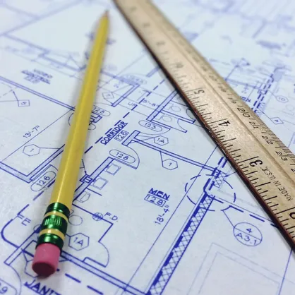Plans blueprint with pencil and ruler