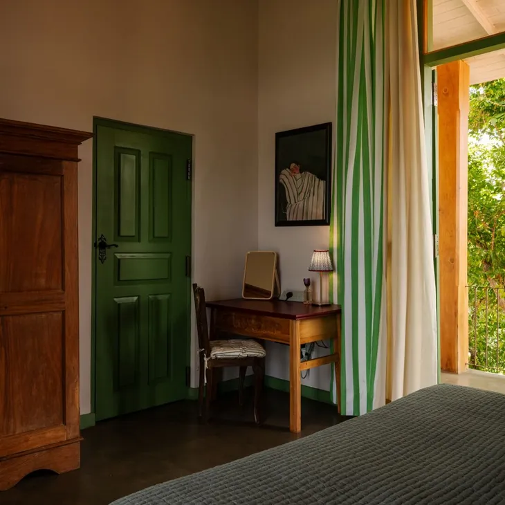 The writing desk and teak wardrobe in the 360 View Suite at Peacock Hill Sigiriya