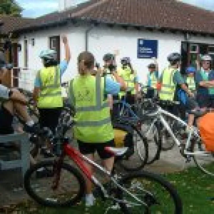 Members of the Bike Club prepare for a ride