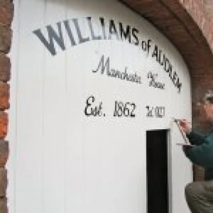 Signwriting at Williams' newsagents