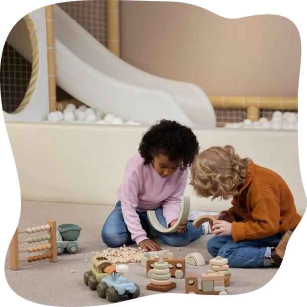 Full shot kids playing with eco toys indoors
