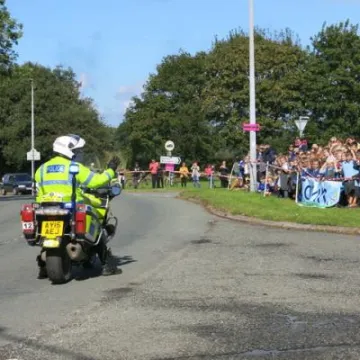 OVO Police motor cyclist  waves to the Tarvin juniors Img_7654 (2)