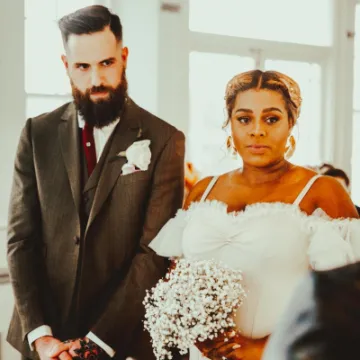 bride in pink ruffled wedding dress