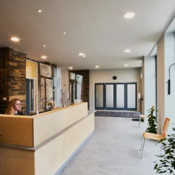 Internal reception shot showing reception and new room