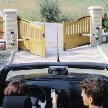 Car at automatic gates
