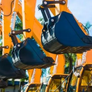 Line of tracked excavators for hire