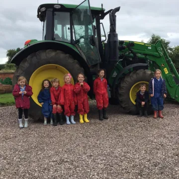 Looking at Farmer Ed's tractor