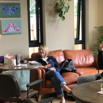 Carers Chatting With a Volunteer At Memory Art Cla