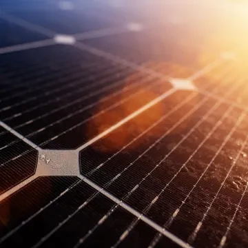 A close up of a solar panel generating electricity from the sun