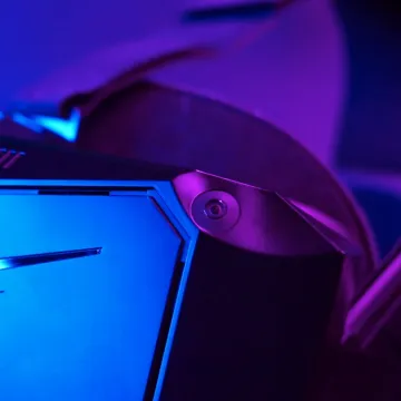 Front view of the Pimax Crystal Light 3 VR headset with blue and magneta lighting