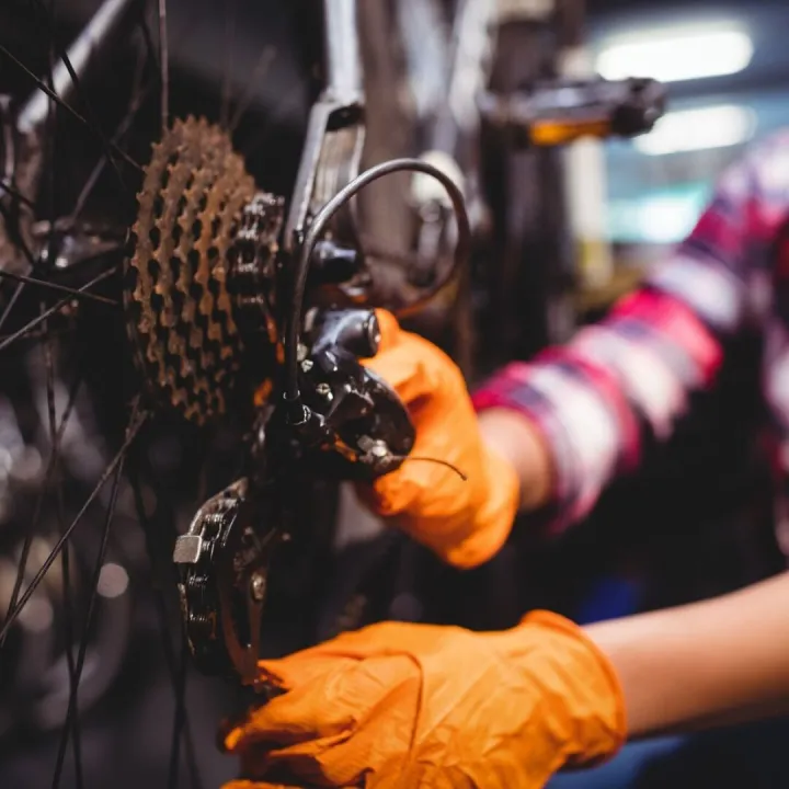 Mechanic repairing a bicycle