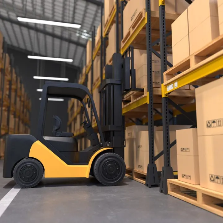 Forklift is lifting a wooden pallet in a warehouse