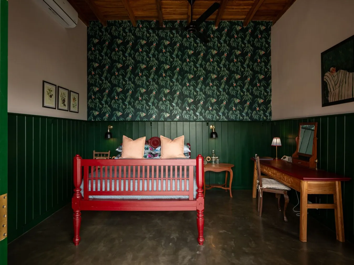 The antique red day bed in the Sigiriya View Suite at Peacock Hill Sigiriya