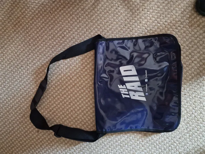 Items for sale &ndash; Large pvc 'THE RAID' shoulder bag with canvas strap. &pound;3