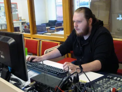 Trinity Rob at the sound desk