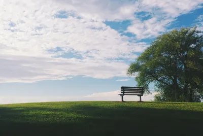 Empty bench on a hill