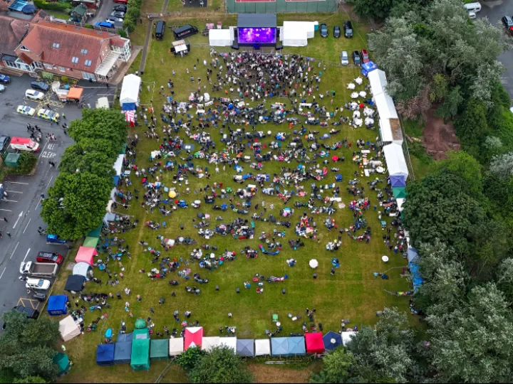 Aerial View of Calling Planet Earth Performing 1