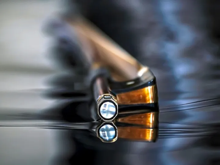 Cello and bow in warm light