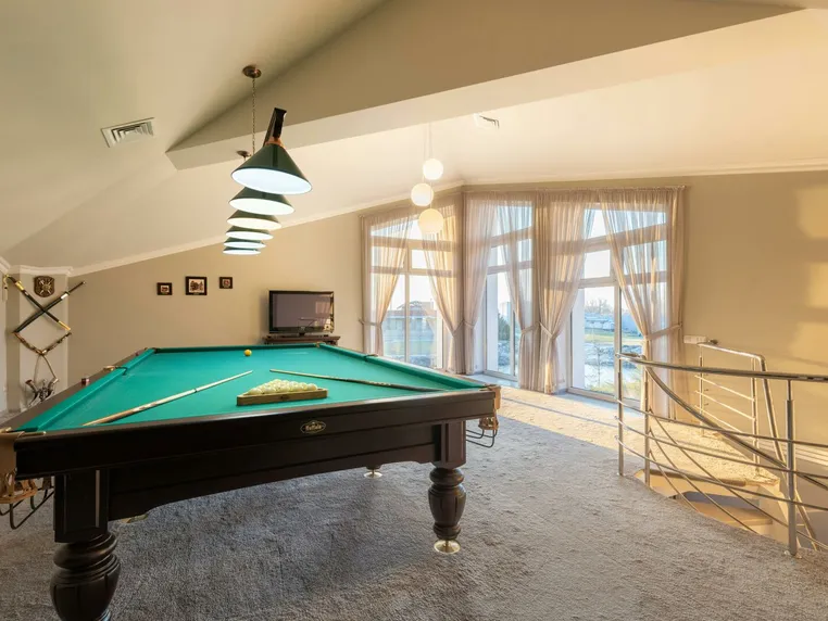 Pool table in a private games room