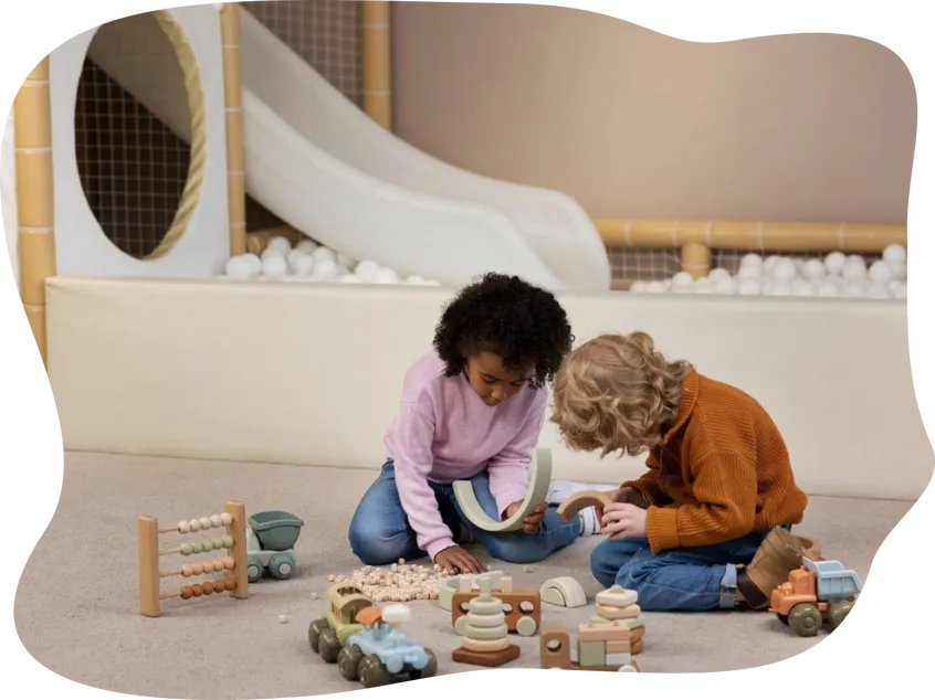 Full shot kids playing with eco toys indoors