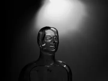 A futuristic transparent mannequin illuminated by
