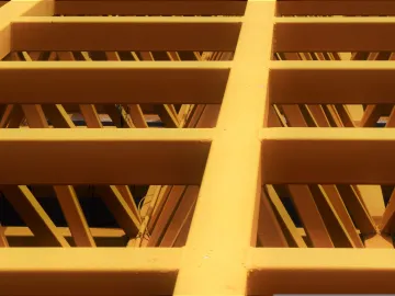 Yellow painted steel girders