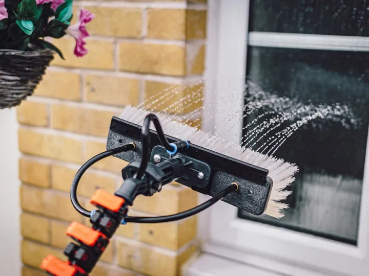 Close-up of water sprinkling on window