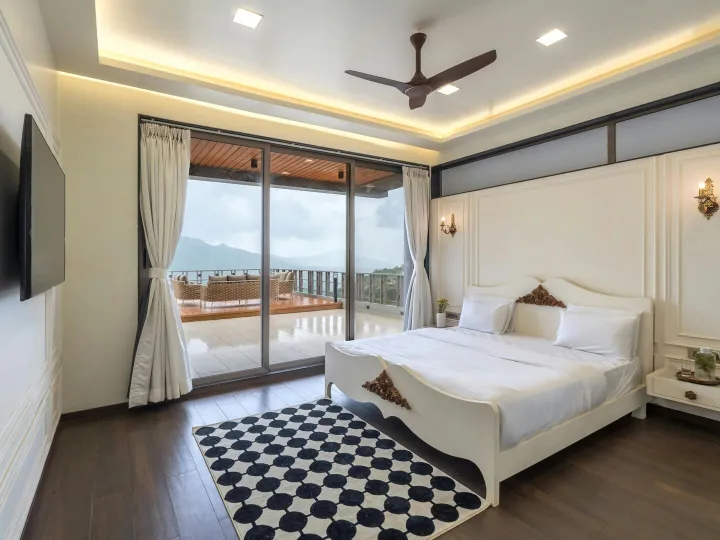 Spacious modern bedroom featuring a double bed
