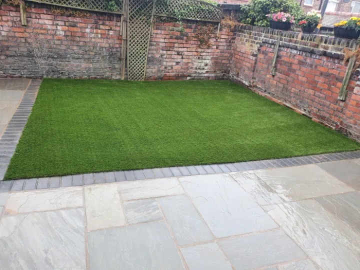 Artificial grass installation in garden